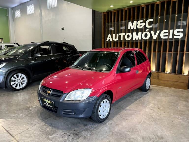 CHEVROLET - CELTA - 2010/2011 - Vermelha - R$ 19.900,00