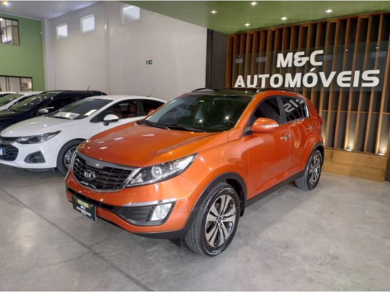 KIA MOTORS - SPORTAGE - 2013/2014 - Laranja - R$ 81.900,00