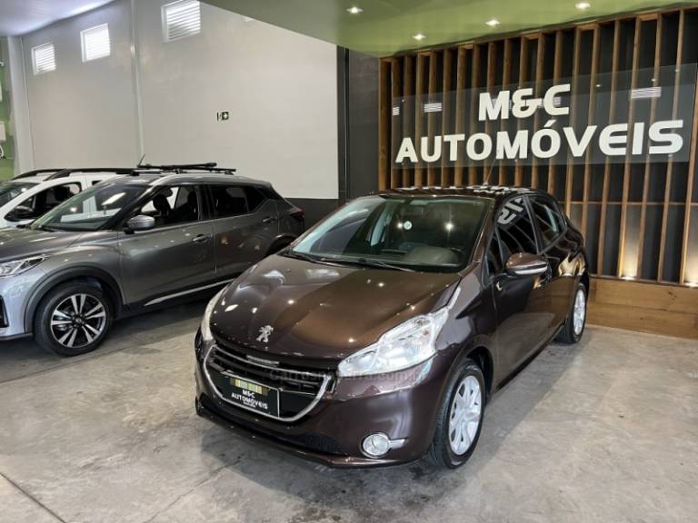 PEUGEOT - 208 - 2013/2014 - Marrom - R$ 38.900,00