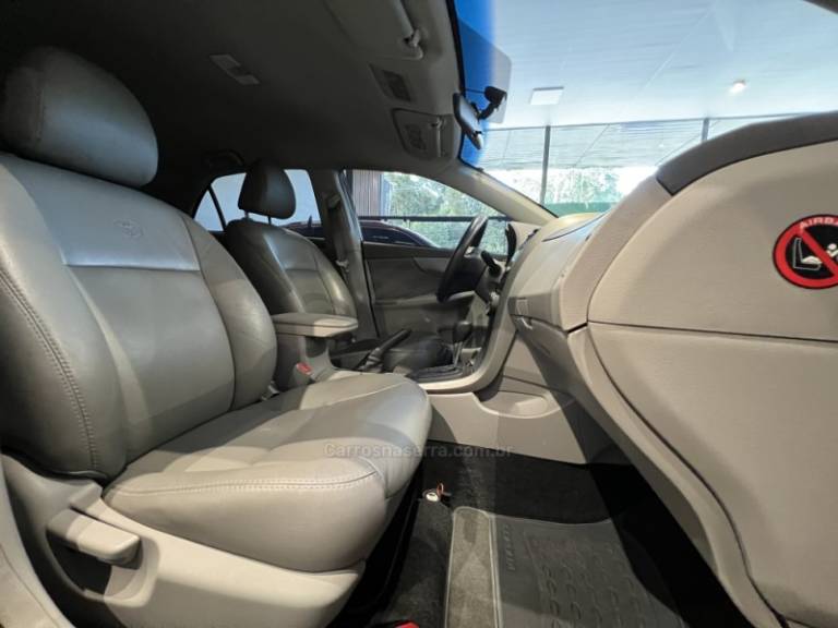 TOYOTA - COROLLA - 2009/2010 - Preta - R$ 51.900,00